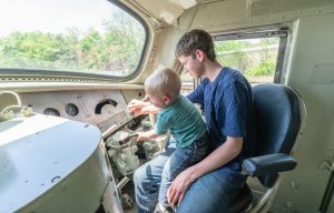 Adult and child inside a train