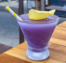 Purple craft cocktail from McGlinns