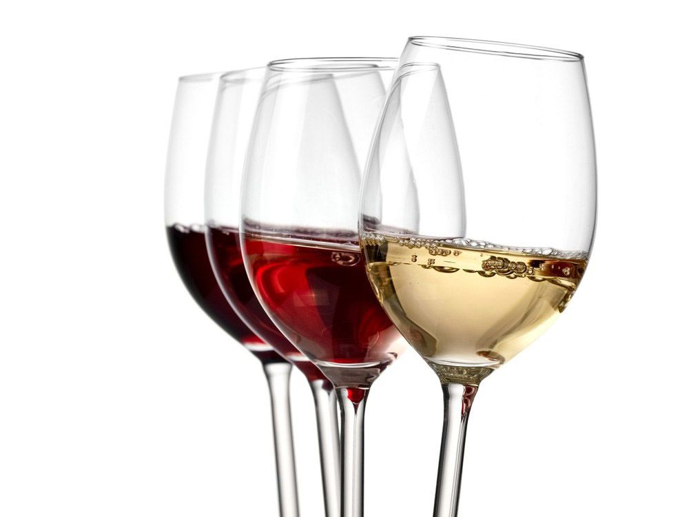 Four wine glasses lined up