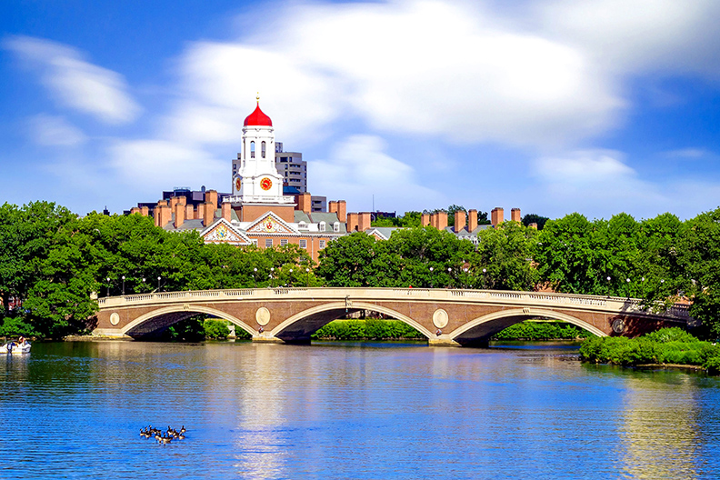Harvard Campus in background of bridge and river 