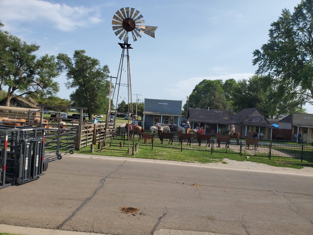 Abilene cowboys herding cattle to the railroad
