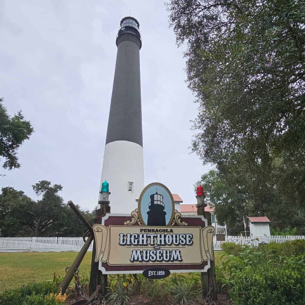 A white and black lighthouse 