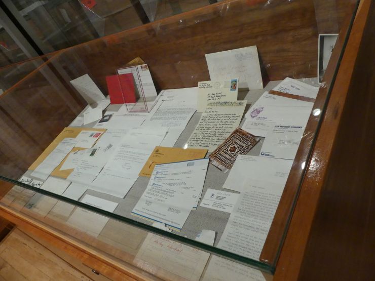 Display case of various hoarded papers from Andy Warhol