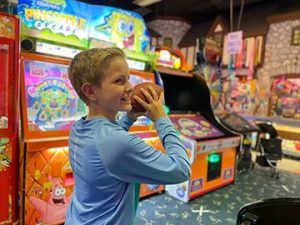 Kid at an arcade
