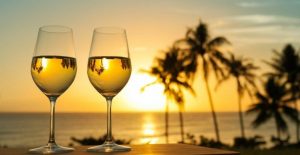 Wine glasses in front of a sunset