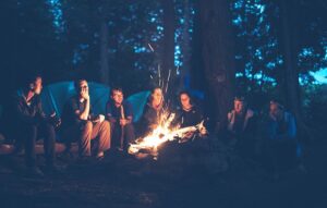 People sitting around a fire