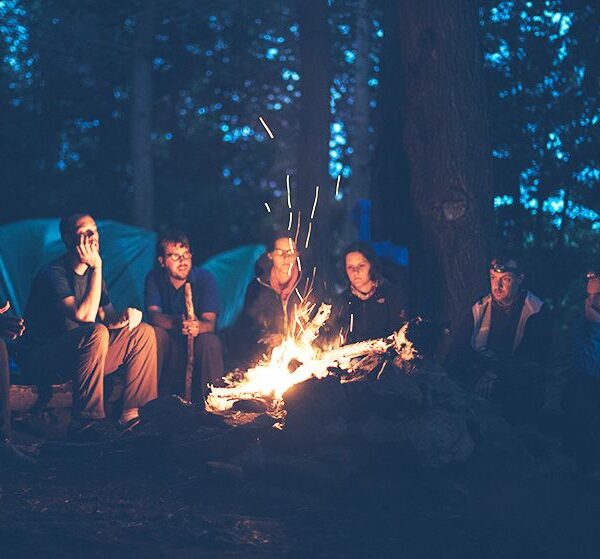 People sitting around a fire