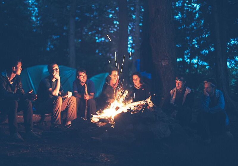 People sitting around a fire