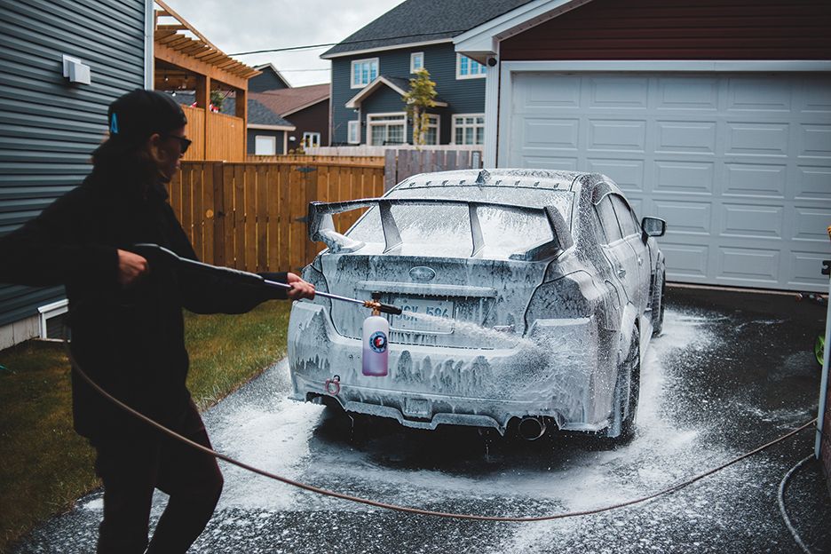 Someone washing a car