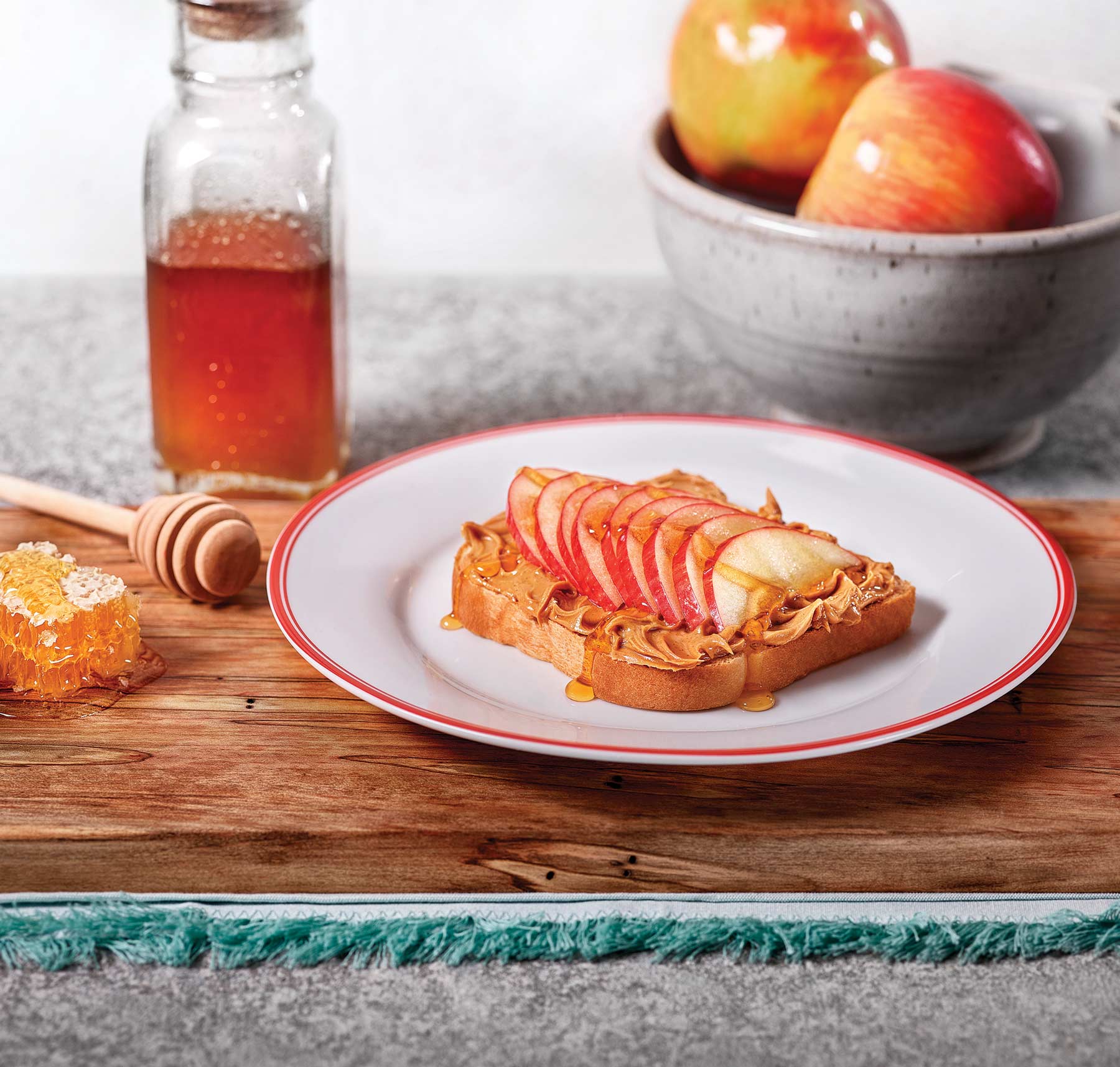 Plate of French Toast with layers of apples on top.