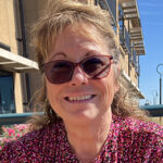 headshot of woman wearing sunglasses