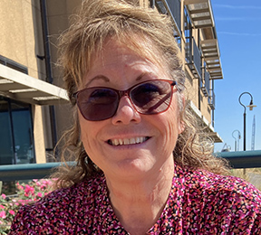 headshot of woman wearing sunglasses