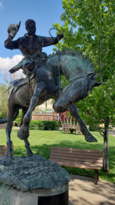 Statue of a cowboy riding a horse at Cowboy Hall of Fame