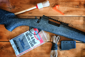 Rifle on a table being cleaned
