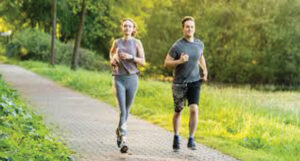 Two people running together