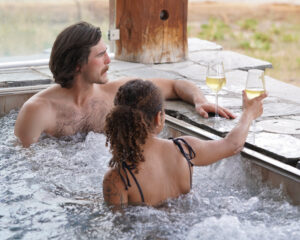 Two people in a hot tub