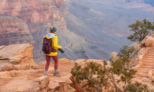 Someone walking the Rim Trail at the Grand Canyon