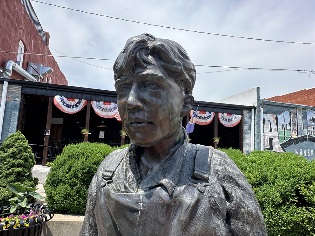 stone staue of a child to depict Eisenhawer as a by