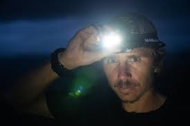 Someone wearing headlamp in the dark