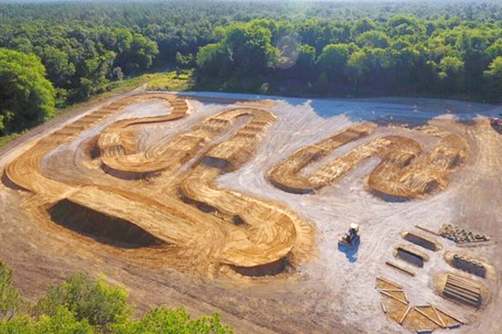 curved dirt pathway in field for ATV riding 