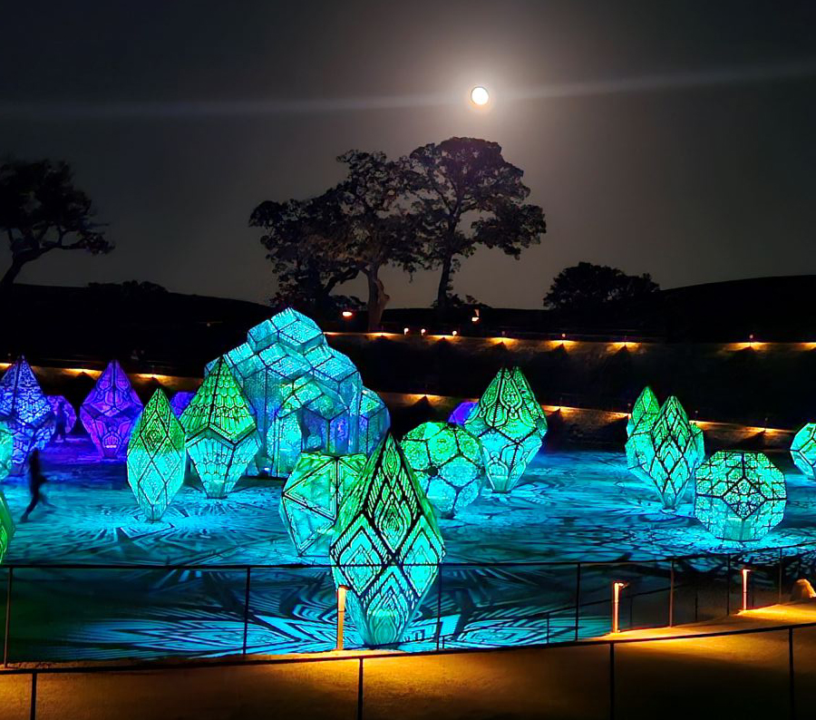 sensorio art installation of torgois giant gemstones against moonlight