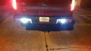 Auxiliary lights on the back of a red truck