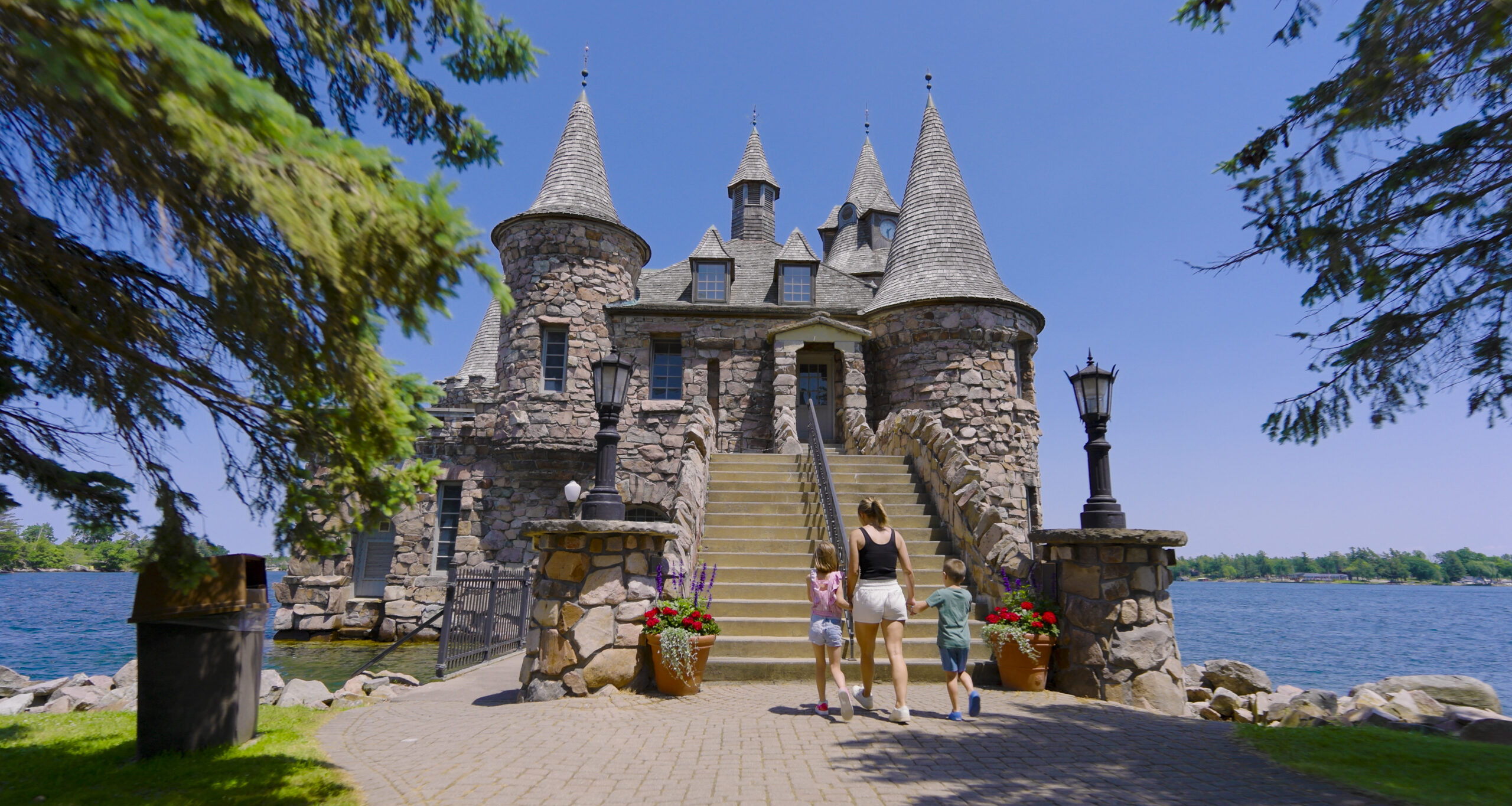 people walking towards a castle.