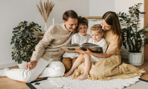 Family relaxing in Utah hotel bed