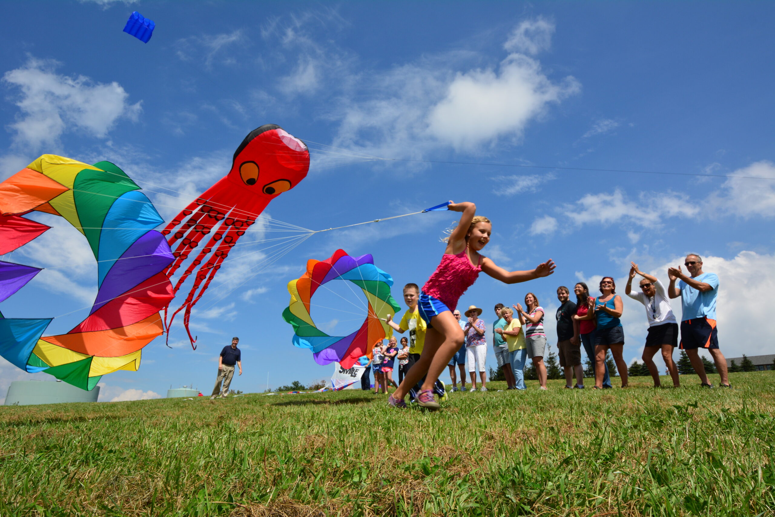 Girl with a colorful kite.
