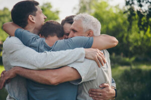 Family bringing it together in a group hug
