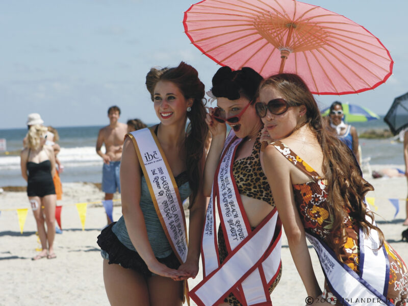 Contestants on the beach