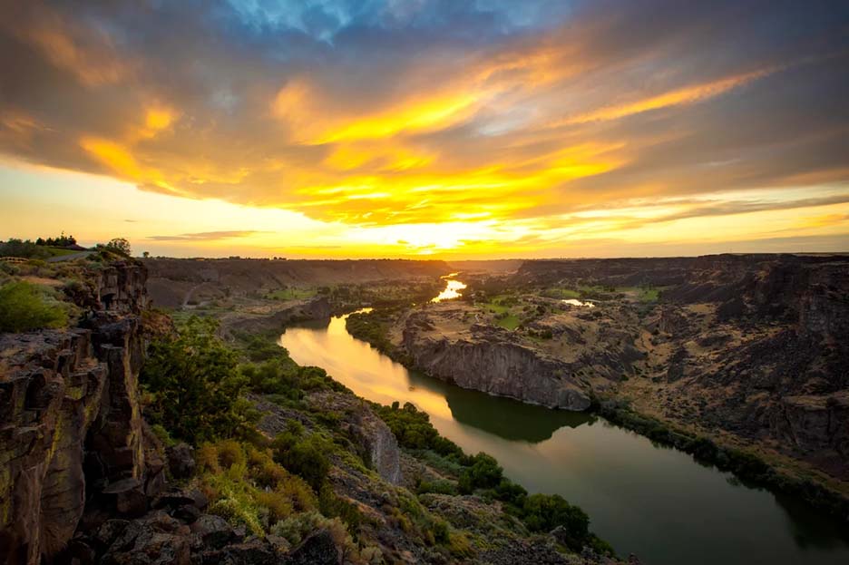hills and river at sunset 
