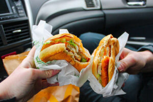 Eating fast food in a car