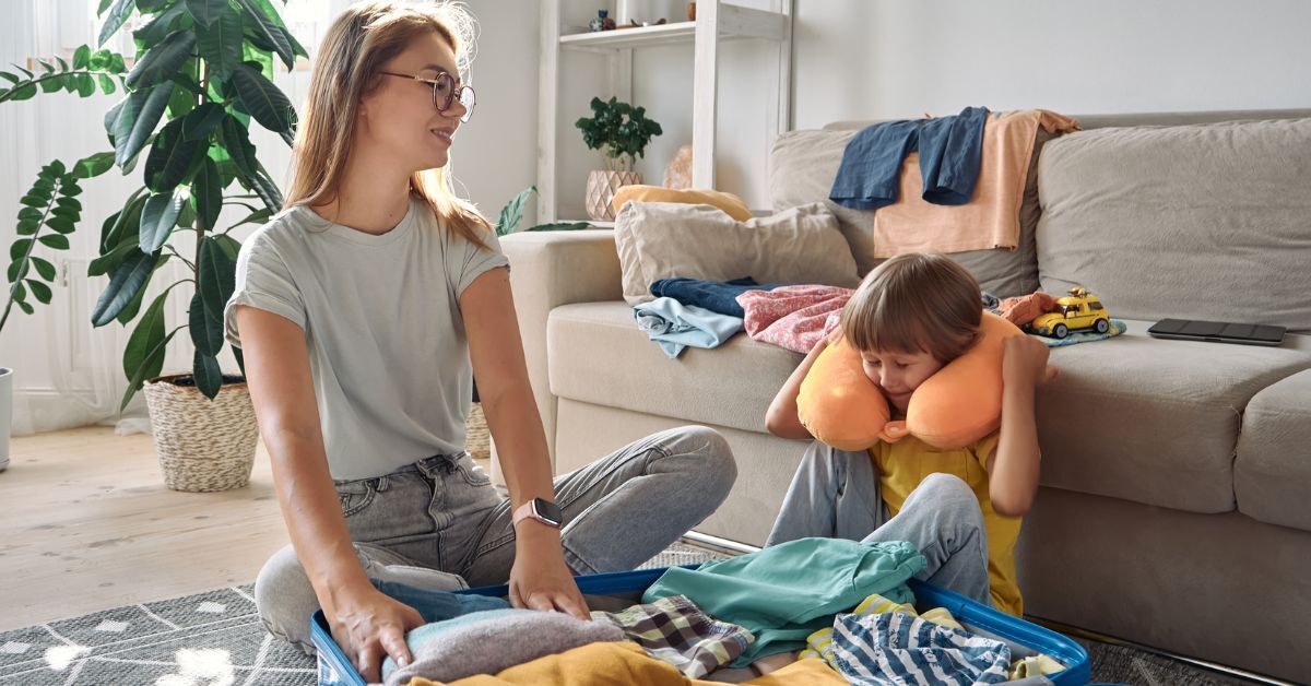 Mom packing suitcase