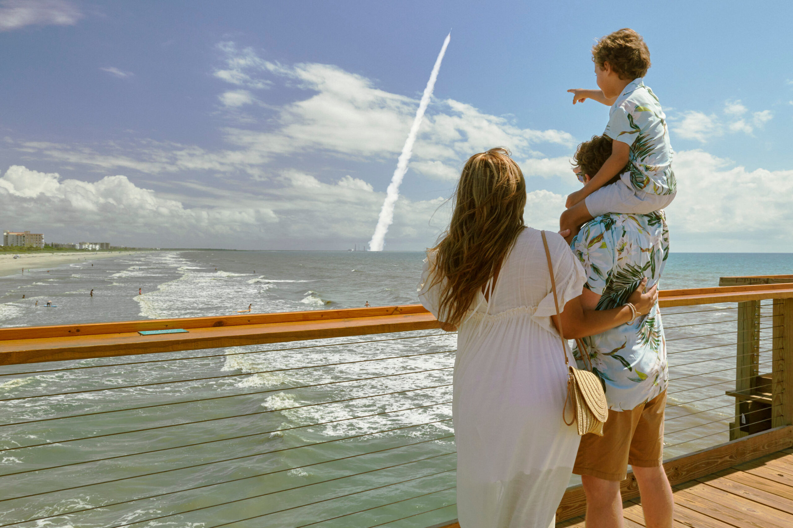 Family watching a blastoff from the Cocoa Pier