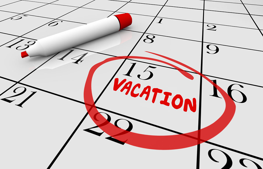 a Calendar chart with the number 15 circled in red and the word vacation written on thatday. A red marker is laying beside it