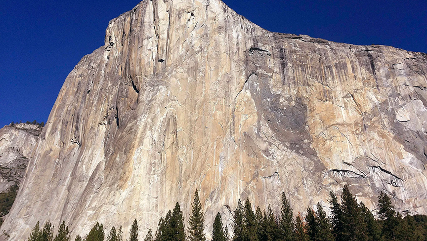 a wall of granite mountin in the yosemite national park